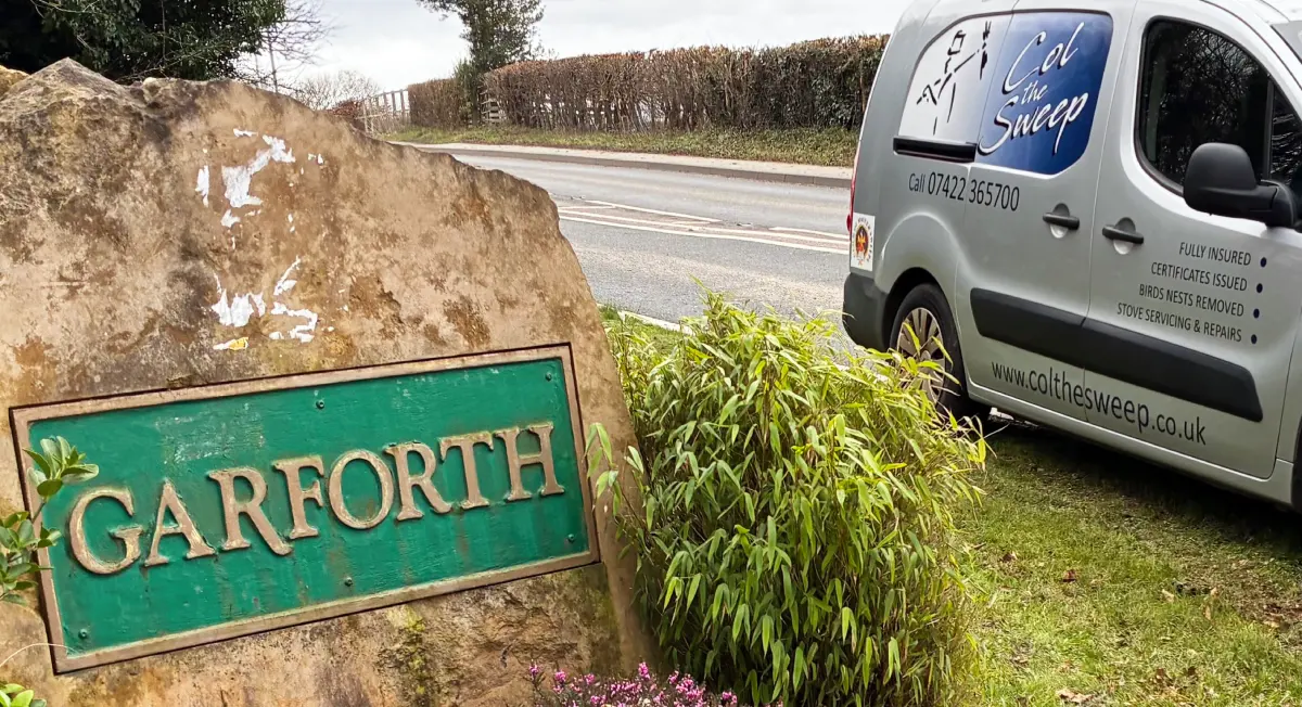 Col The Sweep van near Welcome to Garforth sign